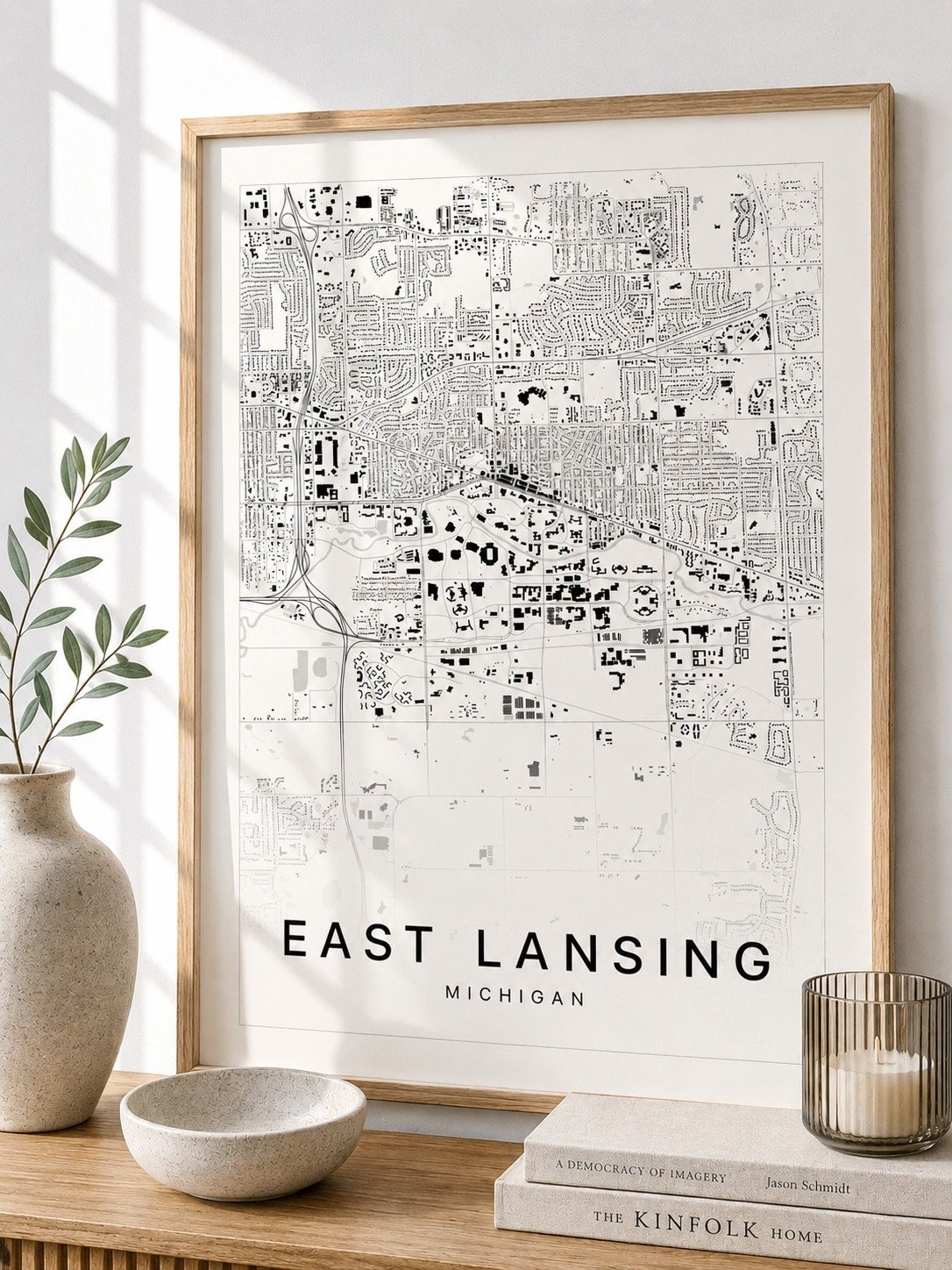 East Lansing map print framed on a wall