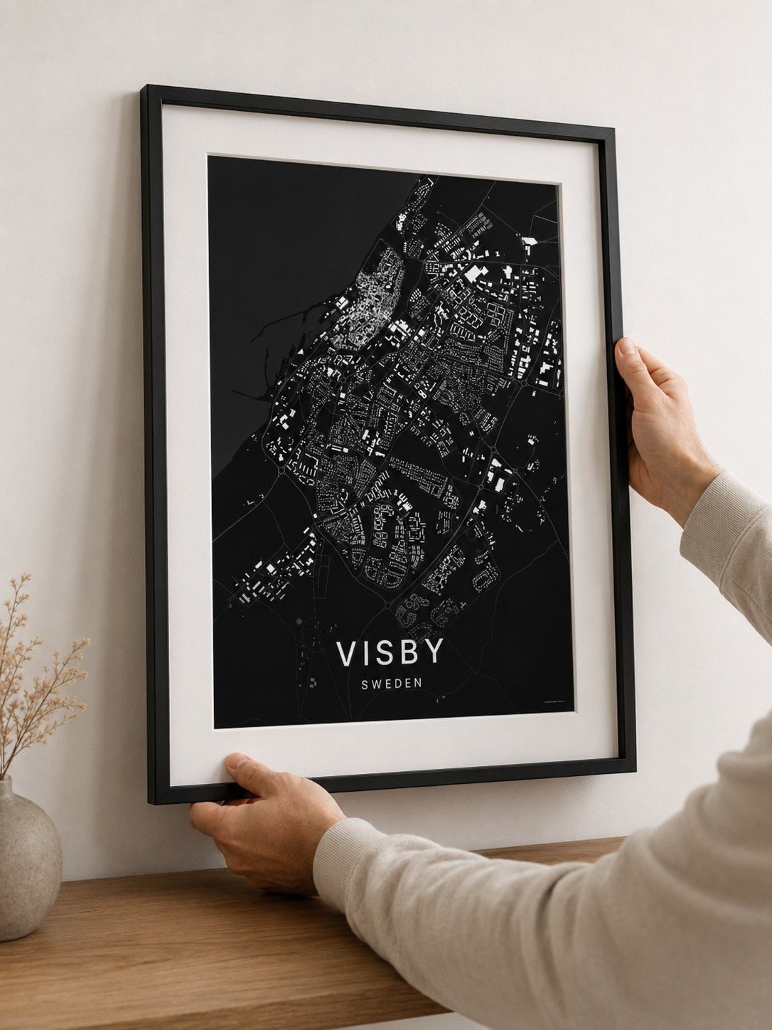 Visby map print framed on a wall